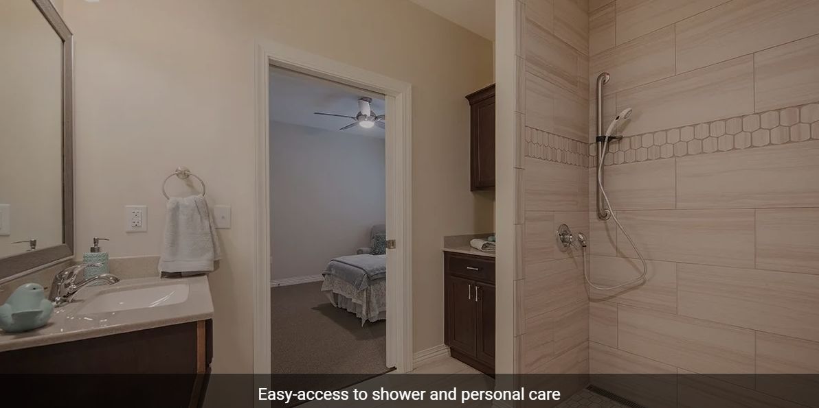 View of a bathroom with easy access to an adjoining bedroom.