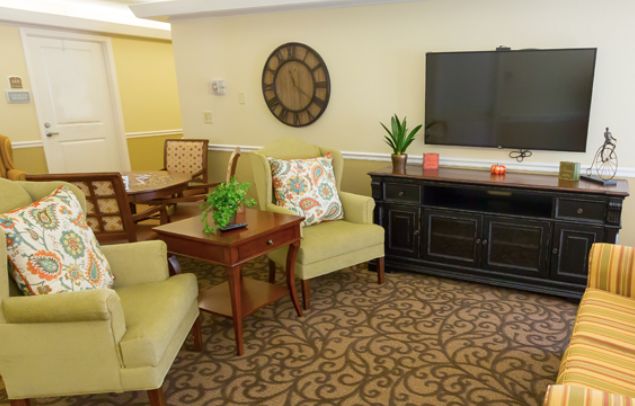 A cozy living room with comfortable seating and tasteful decor.