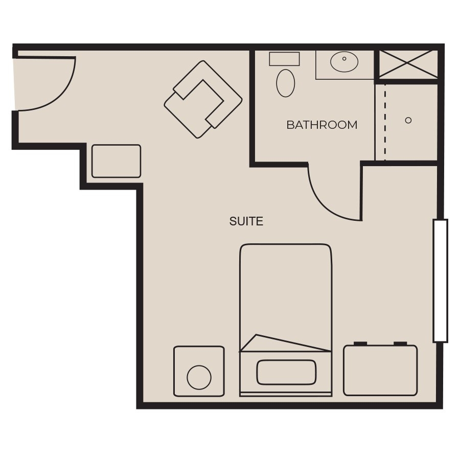 A floor plan of a suite with a bathroom, bed, and seating area.