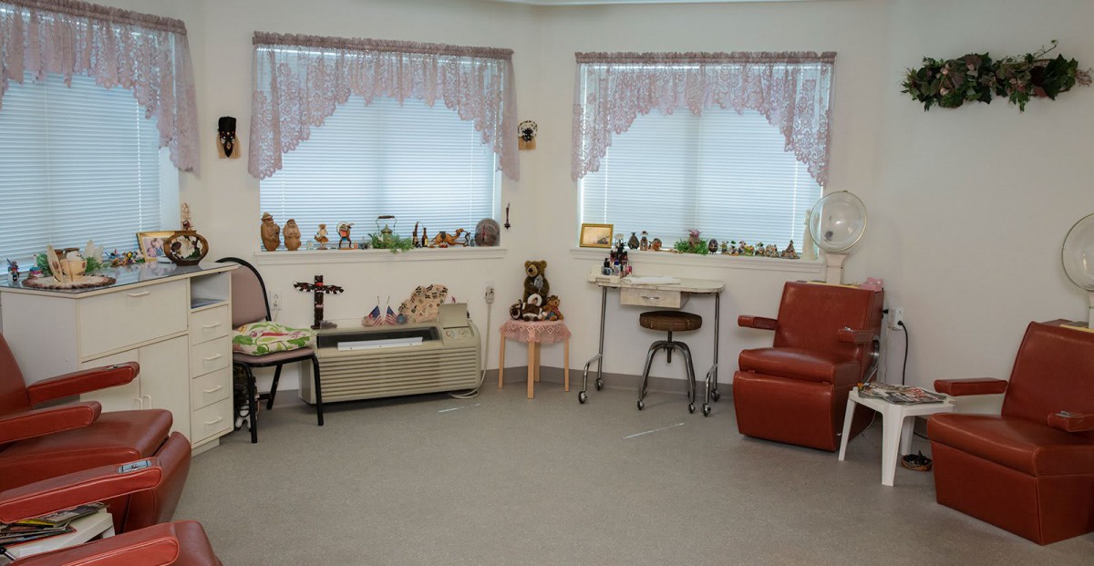 A cozy living room with vintage decor, featuring toys and comfortable seating.