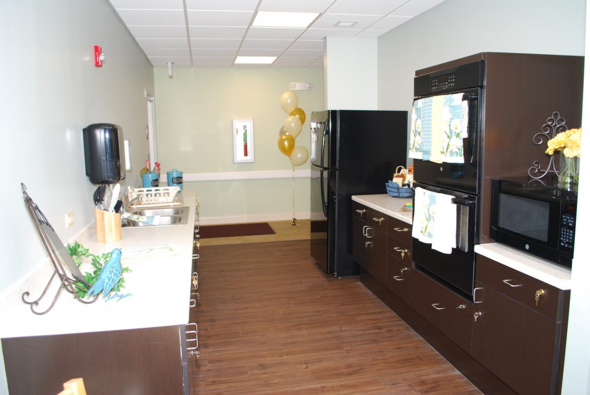 A modern kitchen with sleek appliances and spacious countertops.