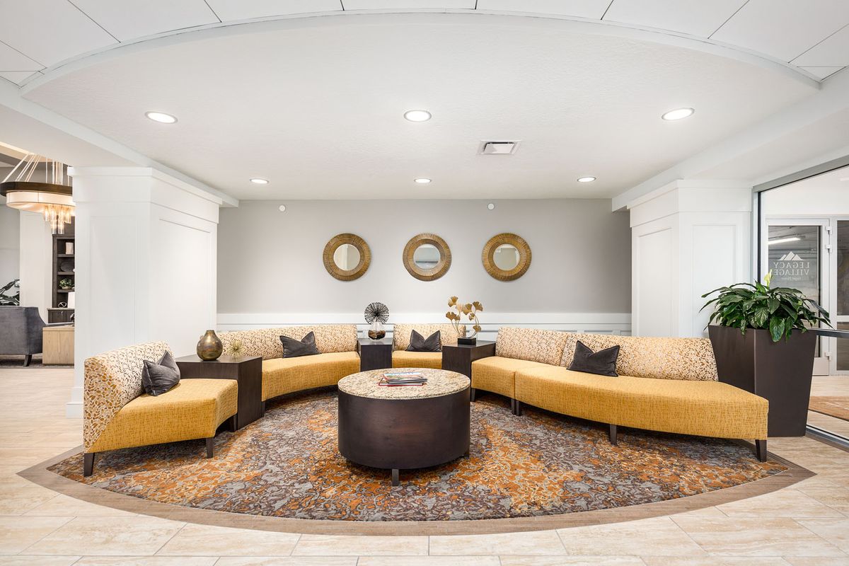 A modern lobby area with comfortable seating and elegant decor.