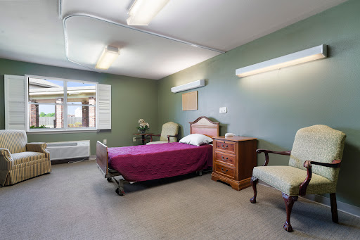 A simple and serene hospital room designed for patient recovery.