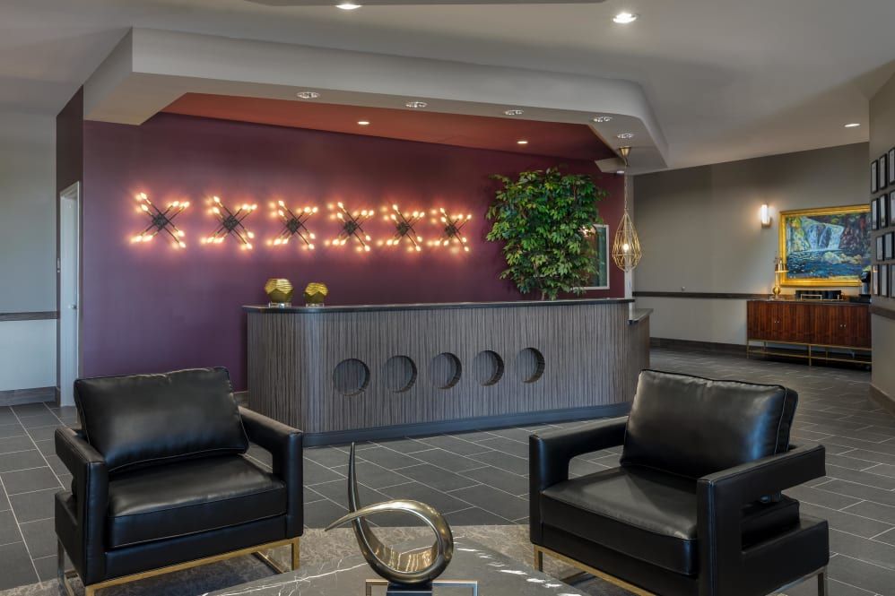 A modern lobby with stylish seating and contemporary lighting.