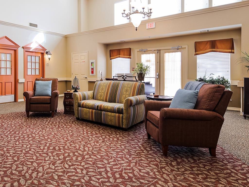 A cozy living room with comfortable seating and warm decor.