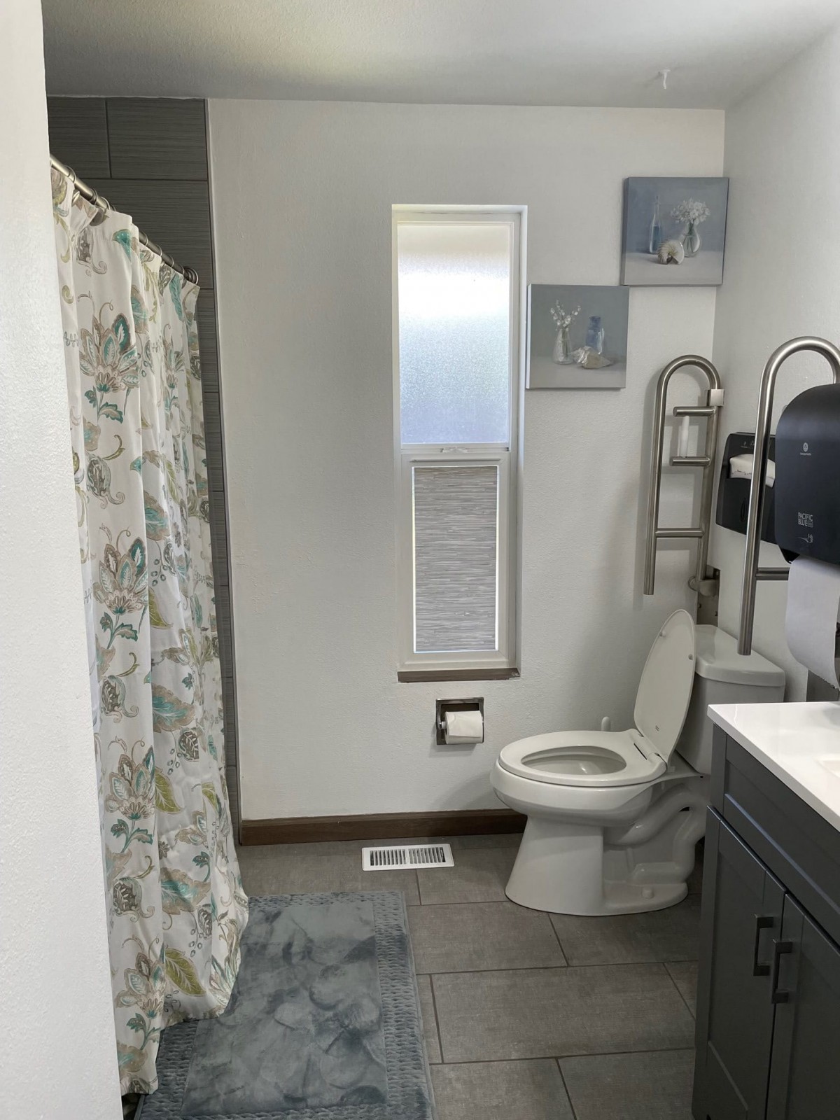 A clean and modern bathroom with essential fixtures.