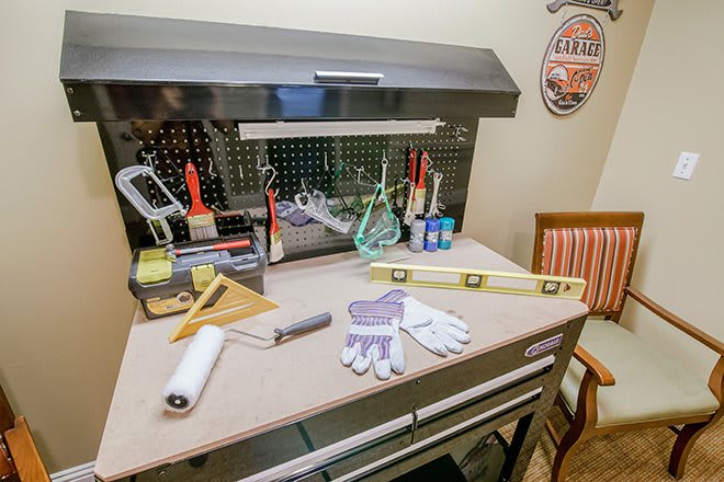 A well-organized workbench with various tools and equipment ready for use.