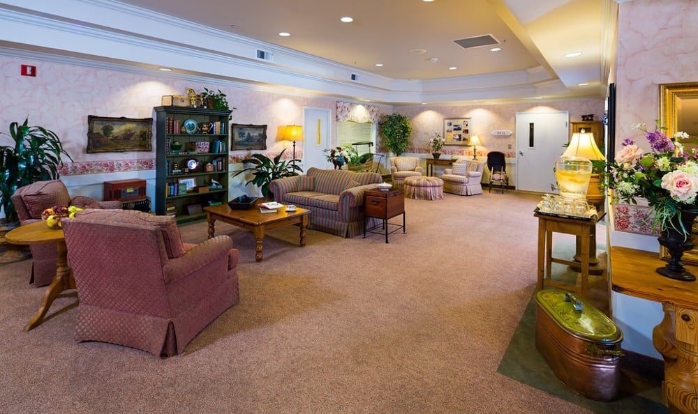 A spacious living room with comfortable seating and ample natural light.