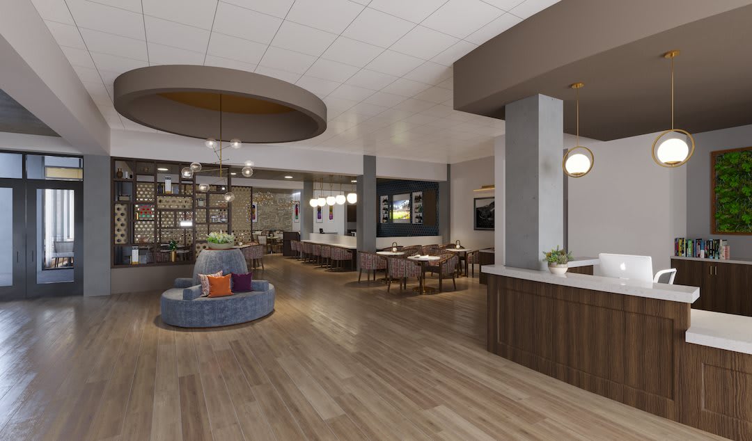 A modern lobby with stylish furnishings and an open seating area.