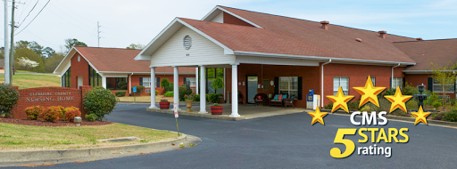 A welcoming entrance to a residential facility with well-maintained landscaping.