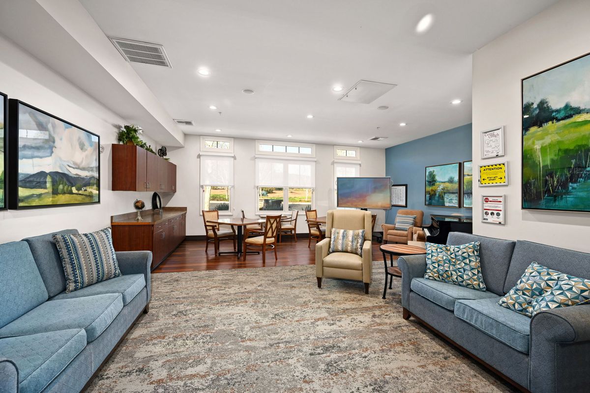 A cozy living room with comfortable seating and stylish decor.