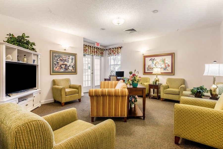 A cozy and inviting living room with comfortable seating and warm decor.