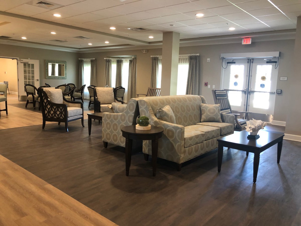 A well-decorated lobby featuring comfortable seating and natural lighting.