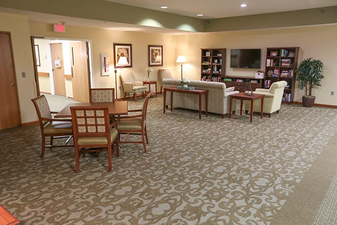 A cozy living room area with comfortable seating and stylish decor.