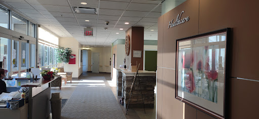 A well-lit hallway showcasing a modern reception area.