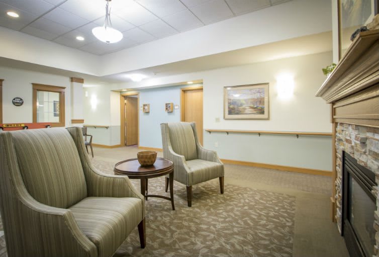 A cozy lobby area with comfortable seating and soft lighting.
