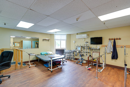 A well-equipped therapy room designed for rehabilitation and physical therapy.