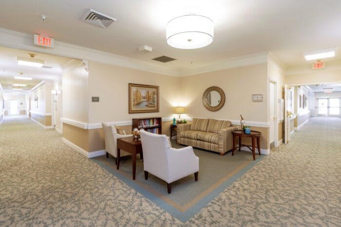 A cozy waiting area featuring comfortable seating and stylish decor.