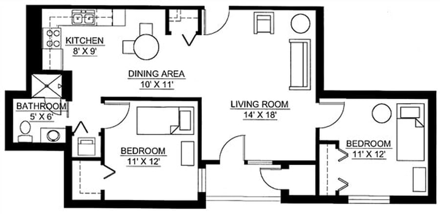 A floor plan of a one-bedroom apartment with labeled areas for the living room, dining area, and bedroom.