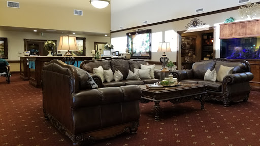 A cozy living room setup featuring a comfortable sofa with decorative pillows and a stylish coffee table.