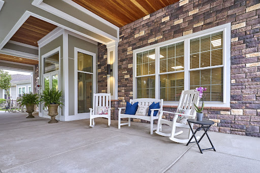 A cozy porch area with rocking chairs and a welcoming vibe.