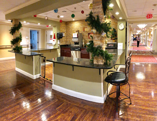 A cozy kitchen and dining area beautifully decorated for the holiday season.