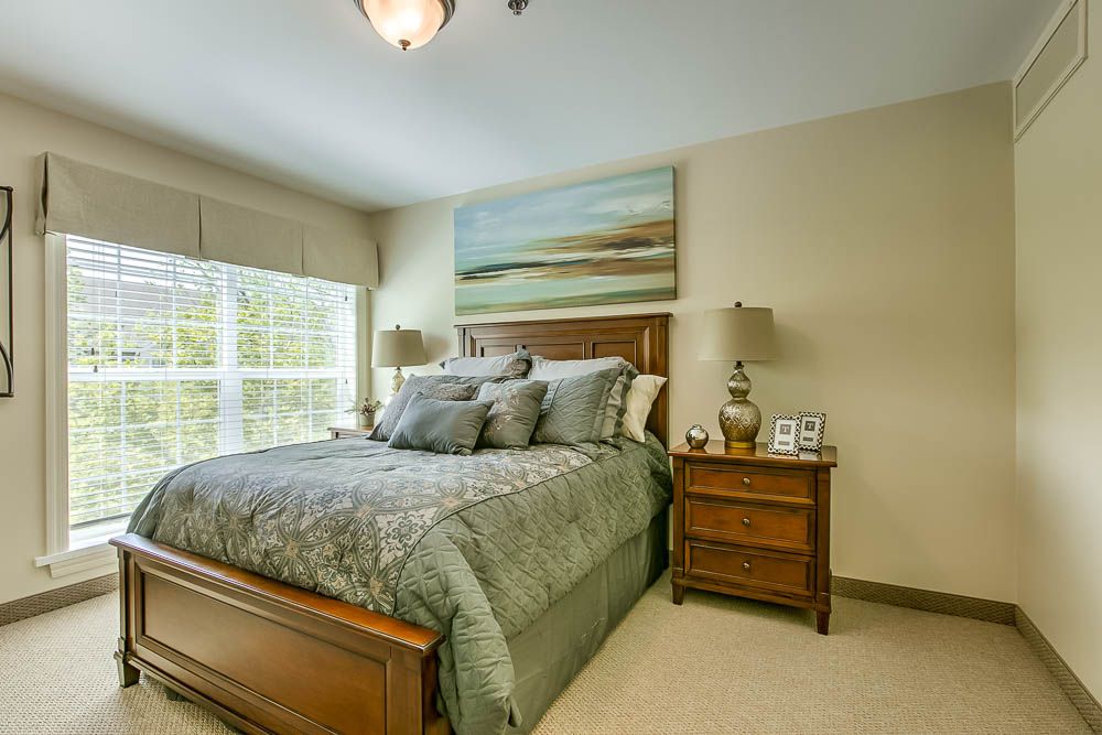 A cozy bedroom with stylish decor and soft lighting.