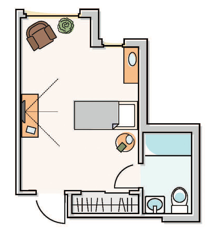 Studio apartment floor plan with furniture arrangement.
