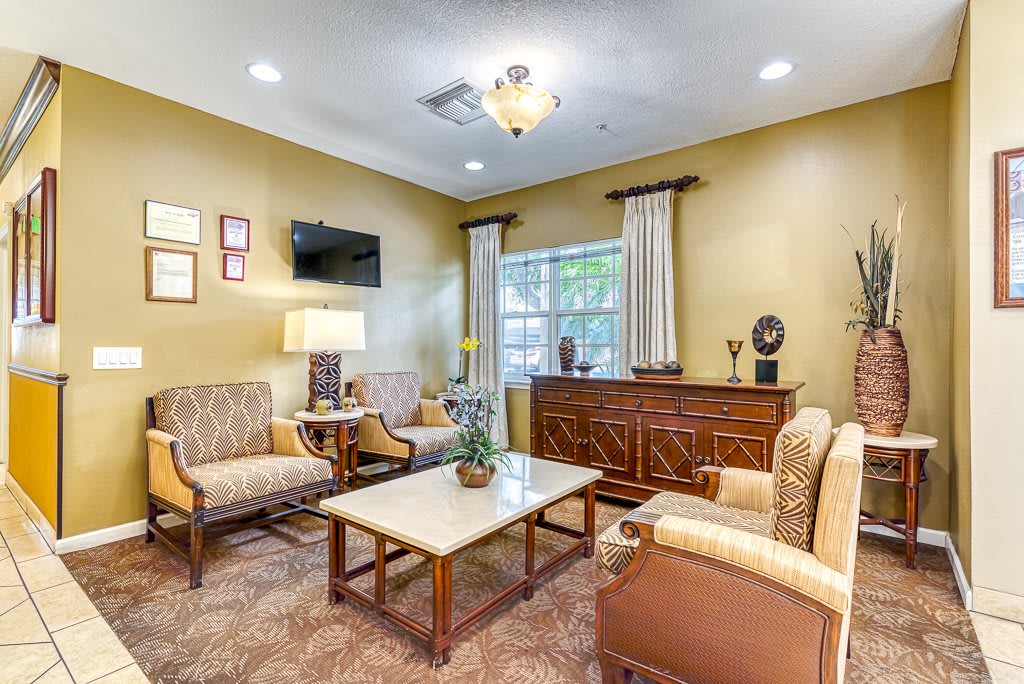 Cozy living room with comfortable seating and elegant decor.