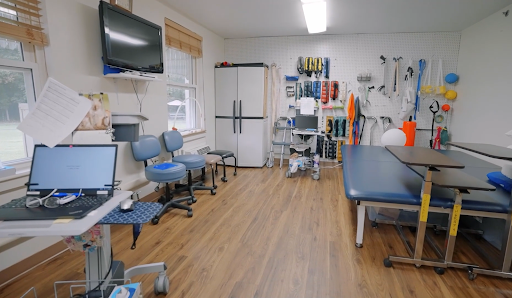 A well-equipped medical treatment room designed for patient care and rehabilitation.