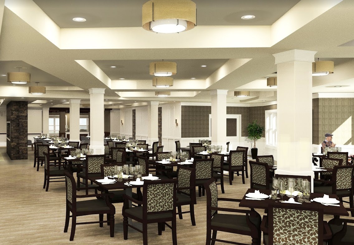 A modern and elegant dining area with well-arranged tables and chairs in a restaurant setting.
