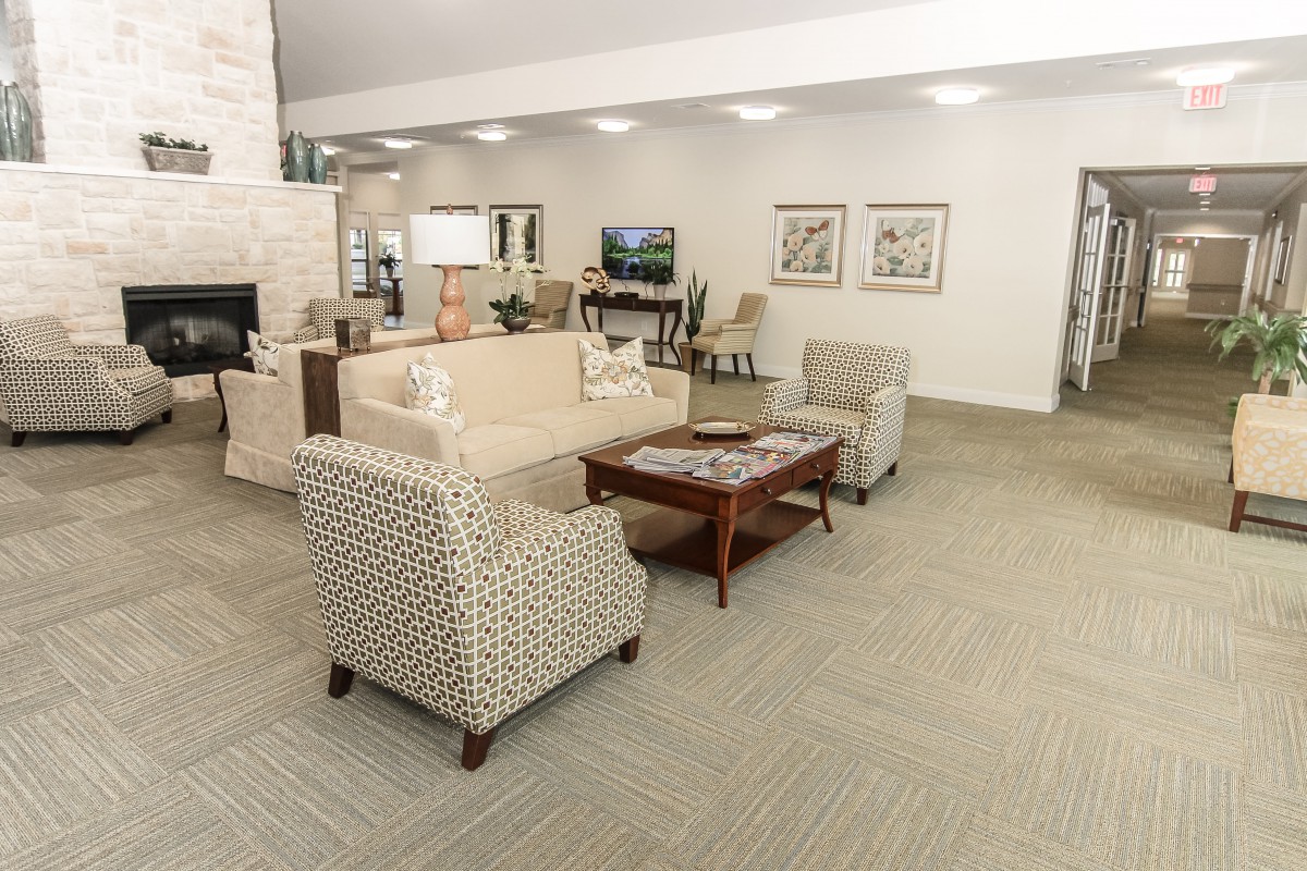 A modern living room with comfortable seating and stylish decor.