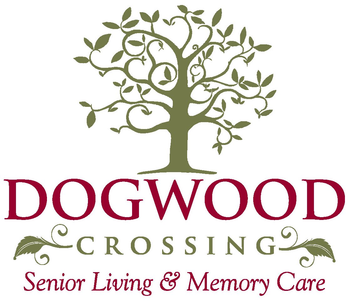 Logo for Dogwood Crossing Senior Living & Memory Care featuring a stylized tree.