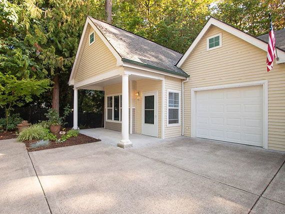 A suburban home with a driveway and attached garage.