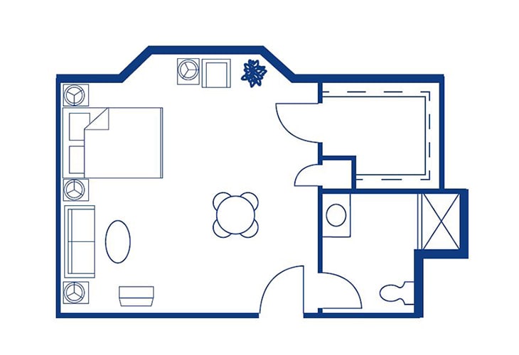 A floor plan of a small apartment showing the arrangement of rooms and furniture.