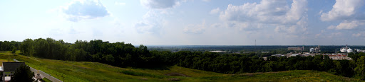 A serene view of the landscape under a cloudy sky.