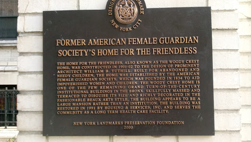 Historical plaque detailing the Former American Female Guardian Society's Home for the Friendless.