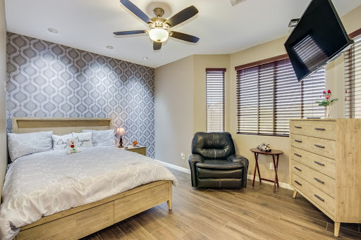 A beautifully designed modern bedroom featuring elegant decor and comfortable furniture.