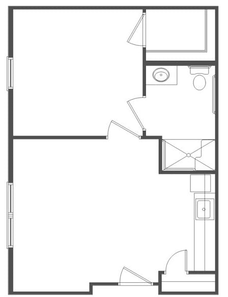 A simple floor plan of an apartment with one bedroom, a bathroom, and a living area.