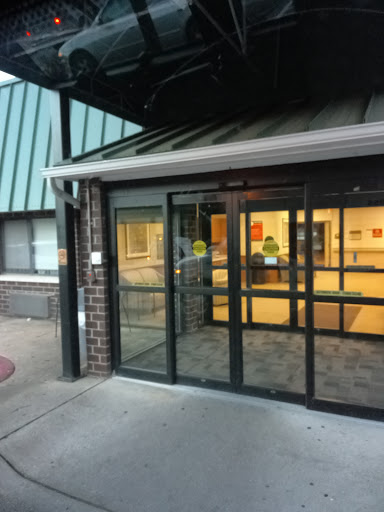 Main entrance with glass doors showcasing a modern architectural design.