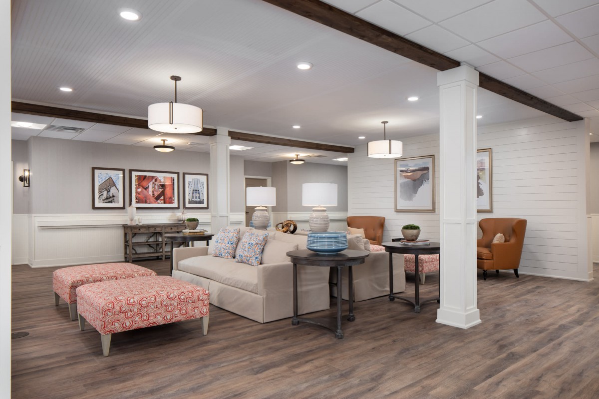A cozy living room featuring modern furniture and stylish decor accents.