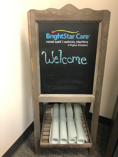 A welcoming sign from BrightStar Care, inviting guests with a friendly message.
