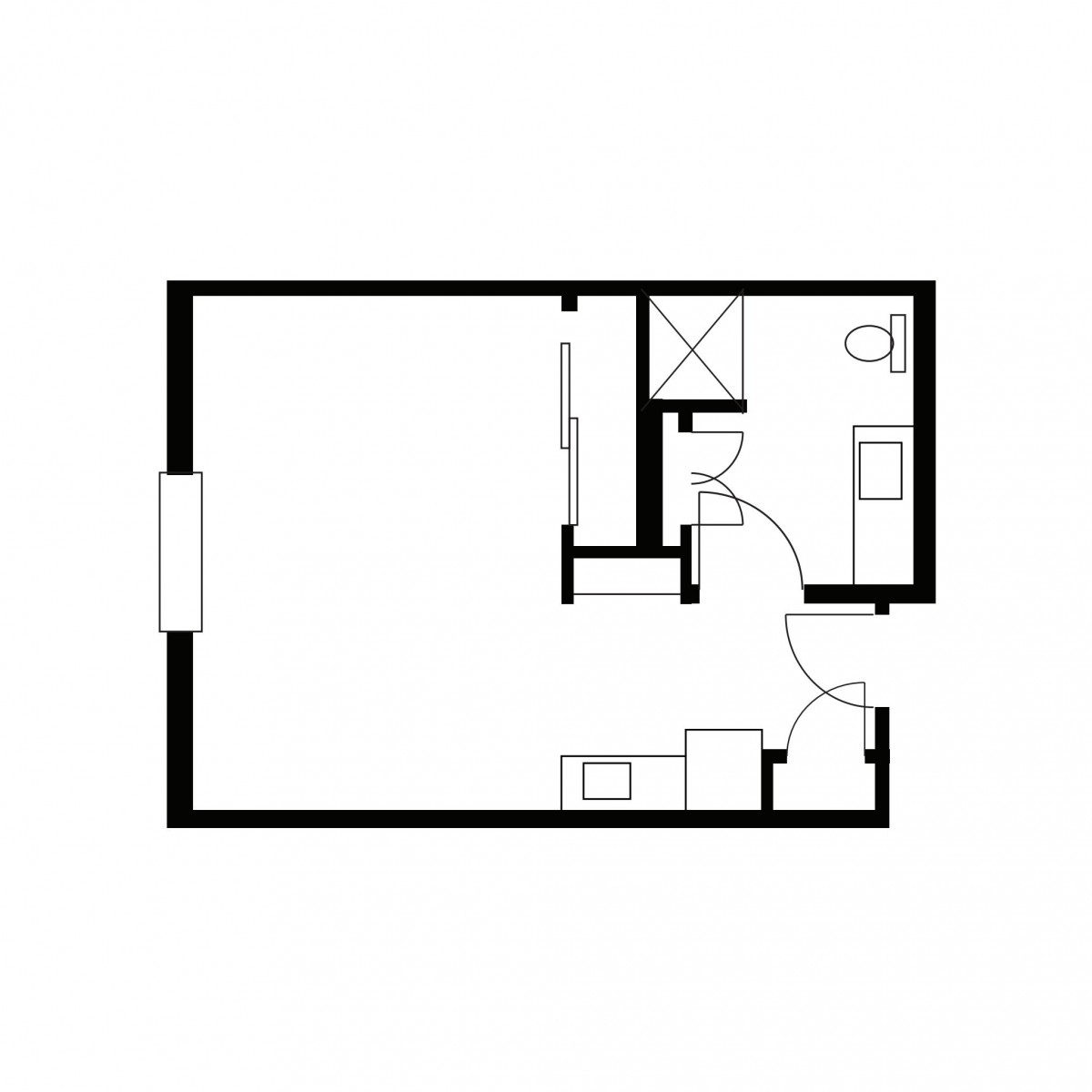 A compact apartment floor plan with a designated bathroom, kitchen, and living area.