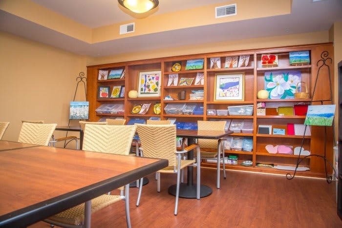 Cozy reading area with bookshelves and seating.