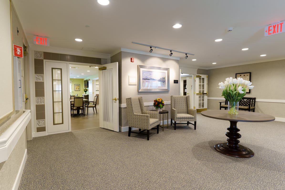A spacious lobby area with elegant seating and decor.