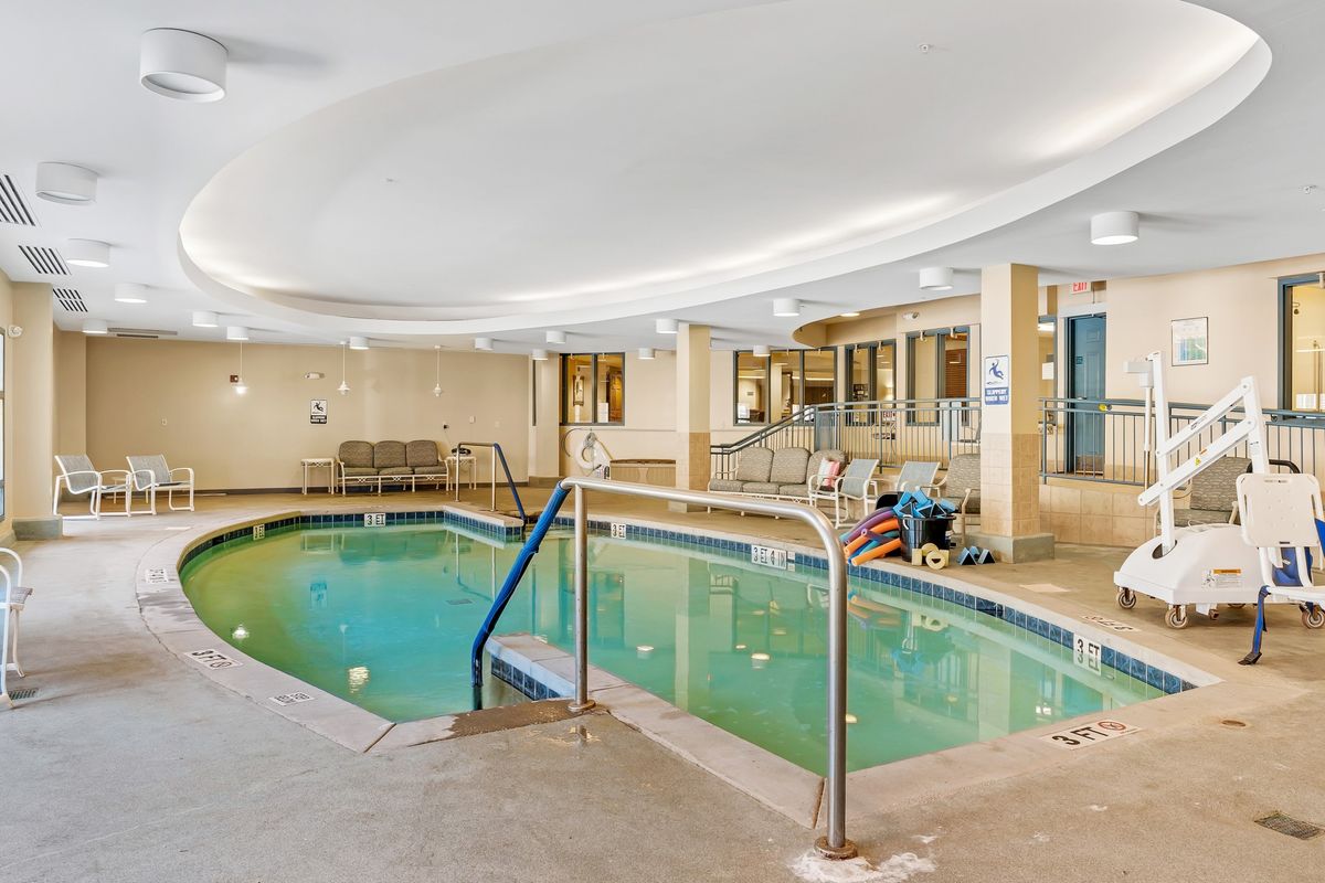 An inviting indoor swimming pool area in a hotel, perfect for relaxation and leisure.