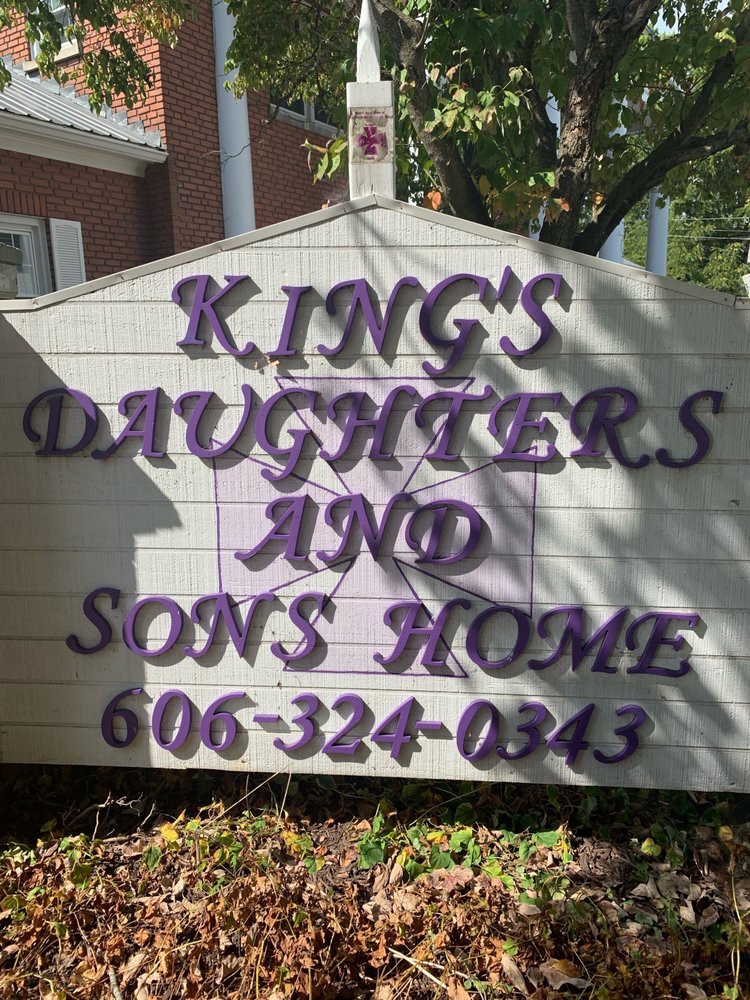 Sign for King's Daughters and Sons Home with contact number.