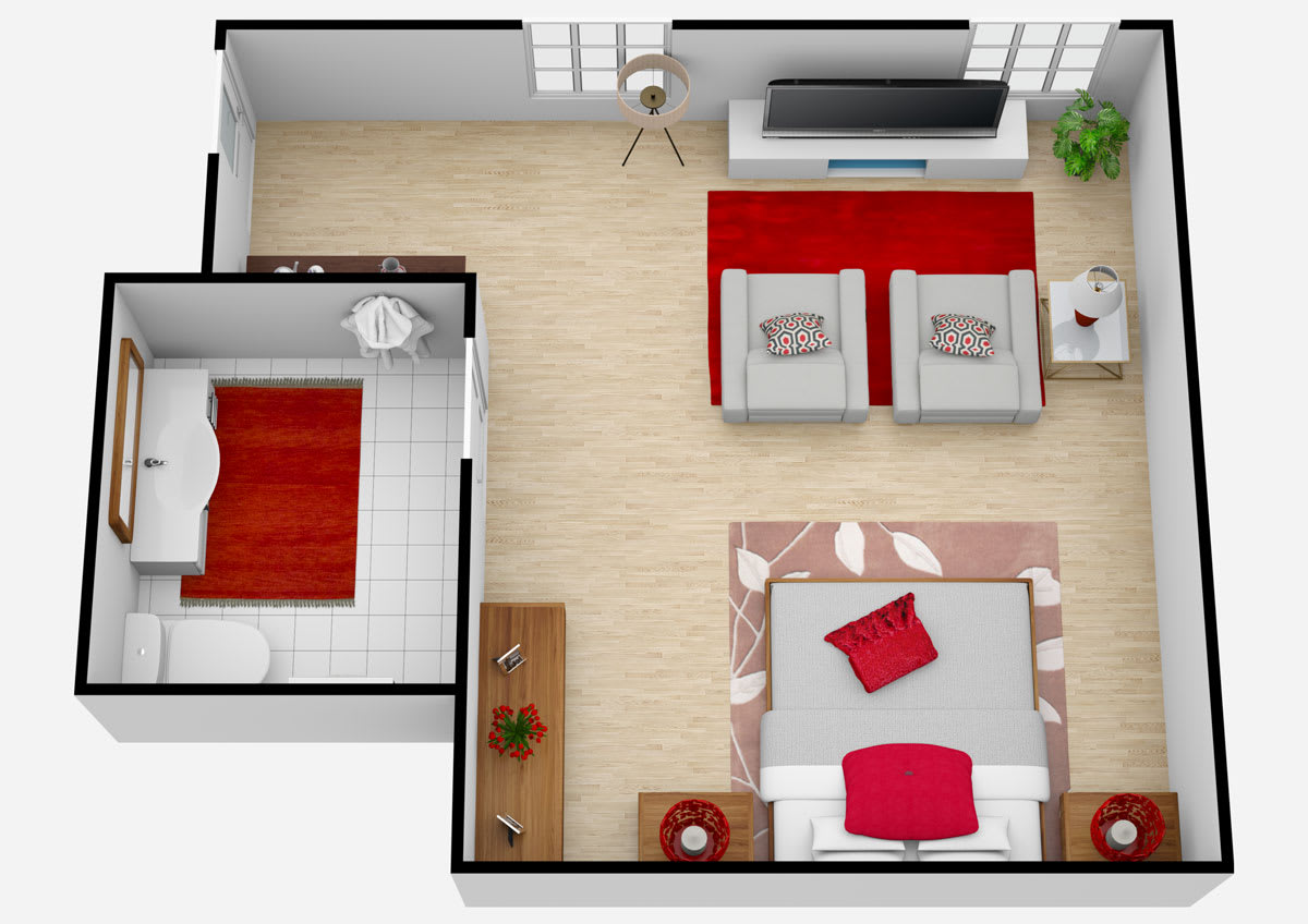 A modern and cozy open-concept floor plan featuring a bedroom and living area with red accents.