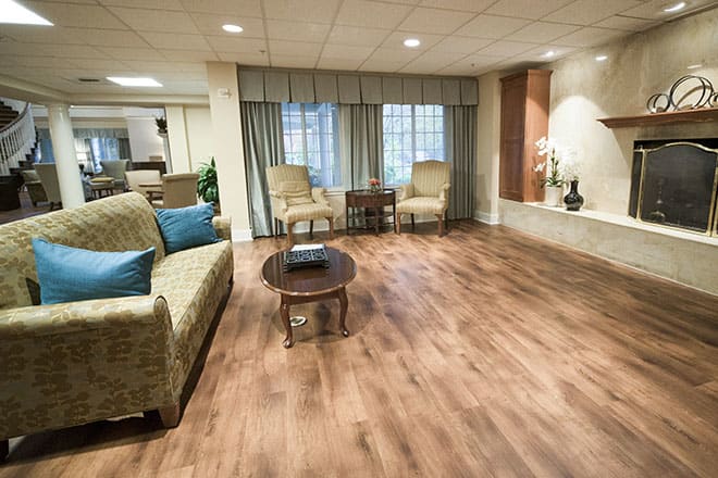 A cozy living room with comfortable seating and elegant decor.