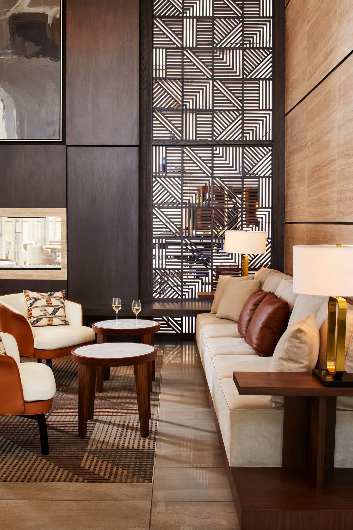 A modern living room with stylish furniture and decorative elements.